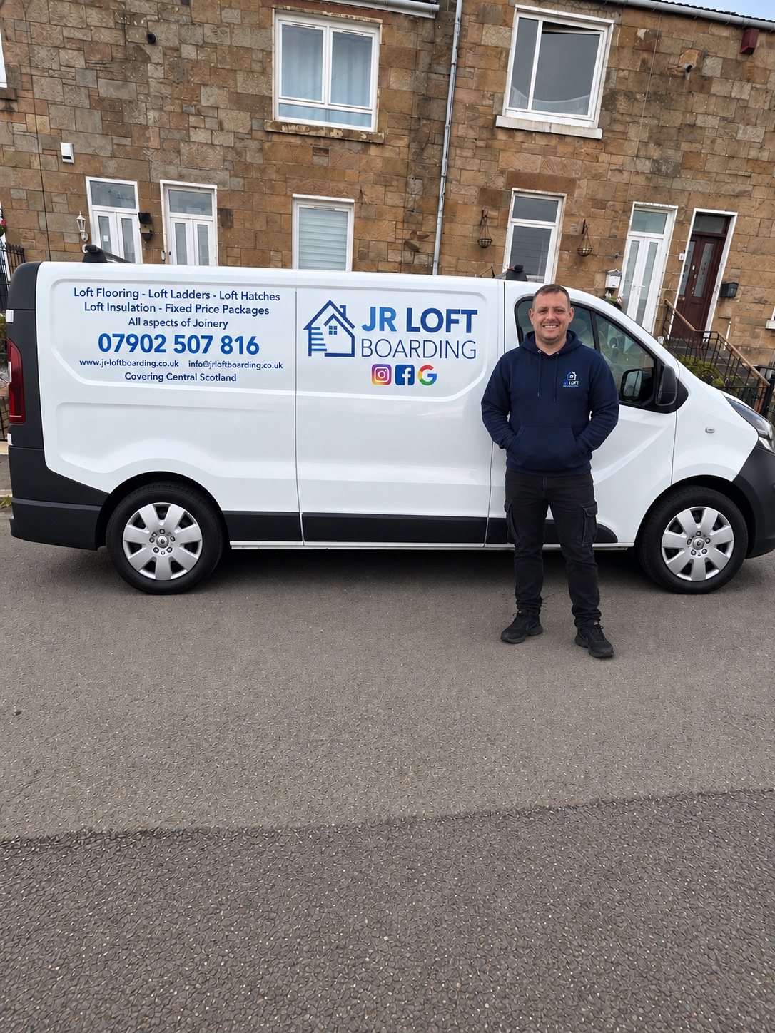 John, owner of JR Loft Boarding, standing beside the company van